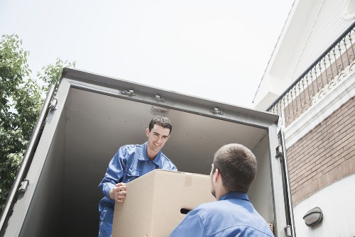 Packed boxes and furniture prepared for small removals service in Isle of Dogs