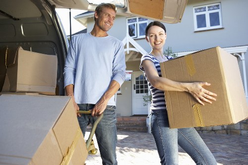 Apartment contents being assessed for a cubic-yard storage quote