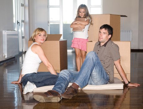 Organized furniture storage space with packed household items